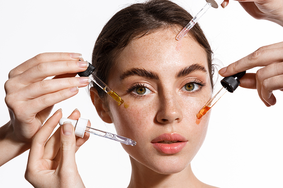 Beauty Face Of Woman With Freckles, Natural Clean And Fresh Glowing Skin, Apply Anti-Aging Collagen Serum