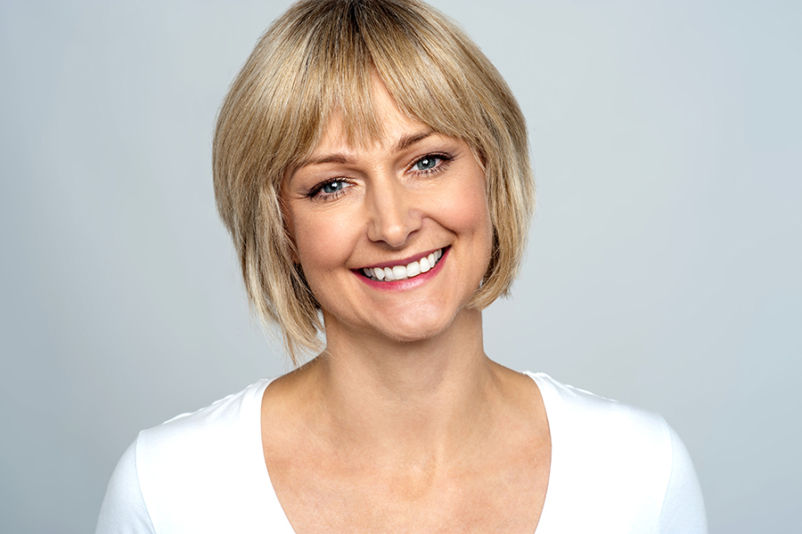 Portrait Of A Smiling Middle Aged Caucasian Woman