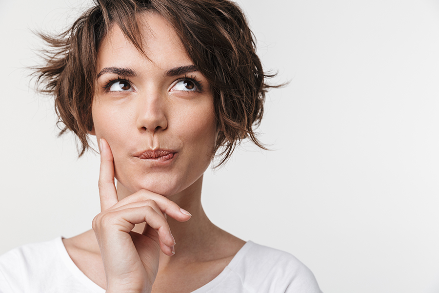 Beautiful Young Pretty Thinking Thoughtful Woman