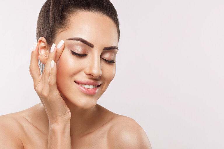 Beautiful Smiling Woman With Healthy Smooth Facial Clean Skin