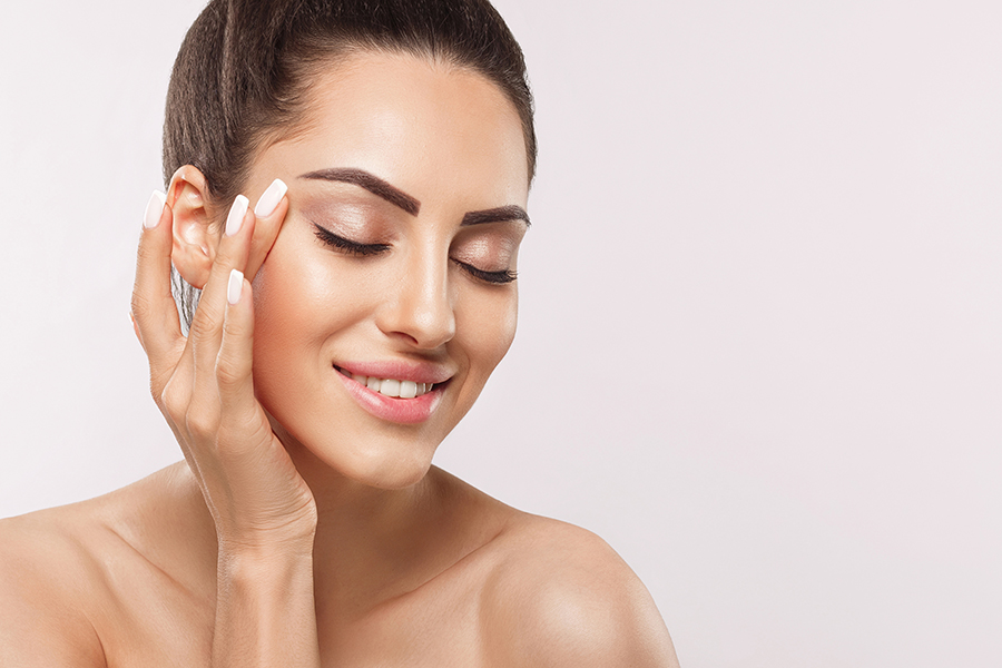 Beautiful Smiling Woman With Healthy Smooth Facial Clean Skin