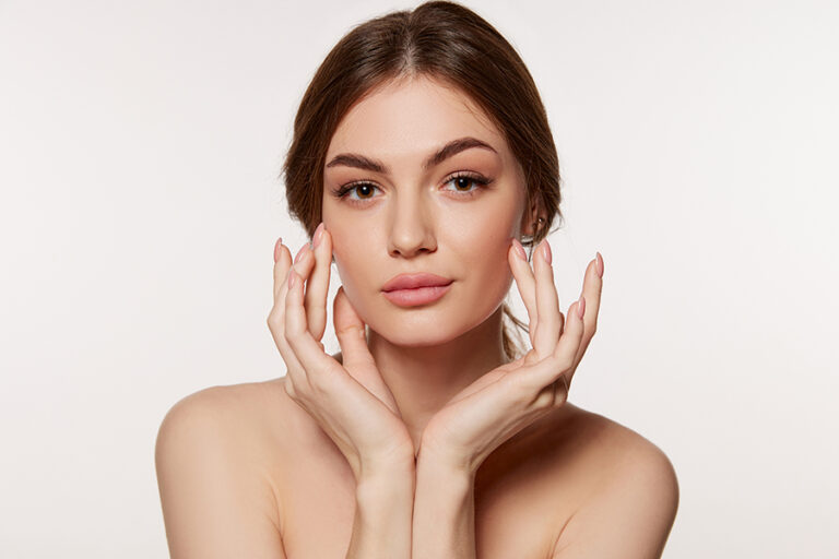 Portrait Of Young Beautiful Woman With Perfect Smooth Skin