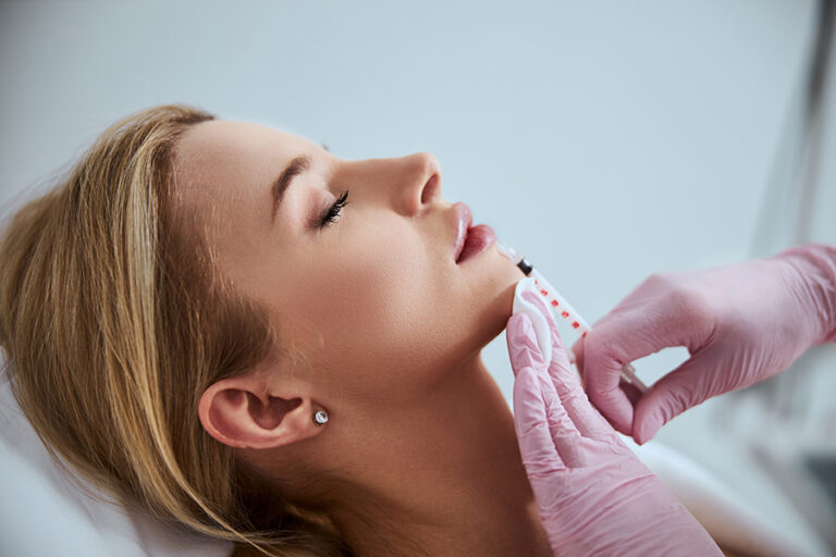Restylane Kysse Lip Filler Treatment Being Administered On Patient
