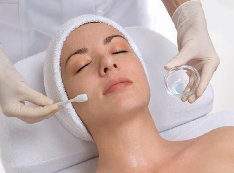 Female Patient Receiving Facial Treatment