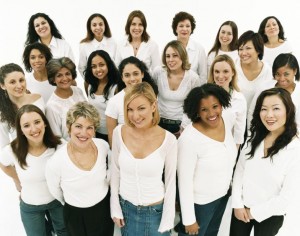 Group Of Women Wearing White Tops And Jeans
