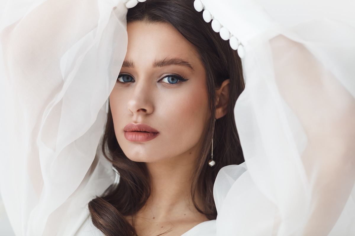 Beautiful Young Woman In White Dress